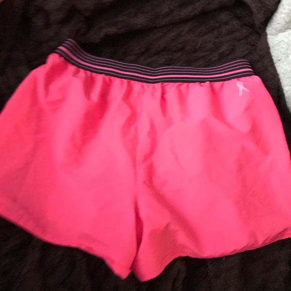 Hot pink UA Under Armour running shorts - Picture 2 of 7
